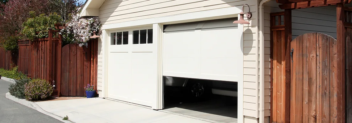 Fix Metal Garage Door Jerking in Greenacres, Florida